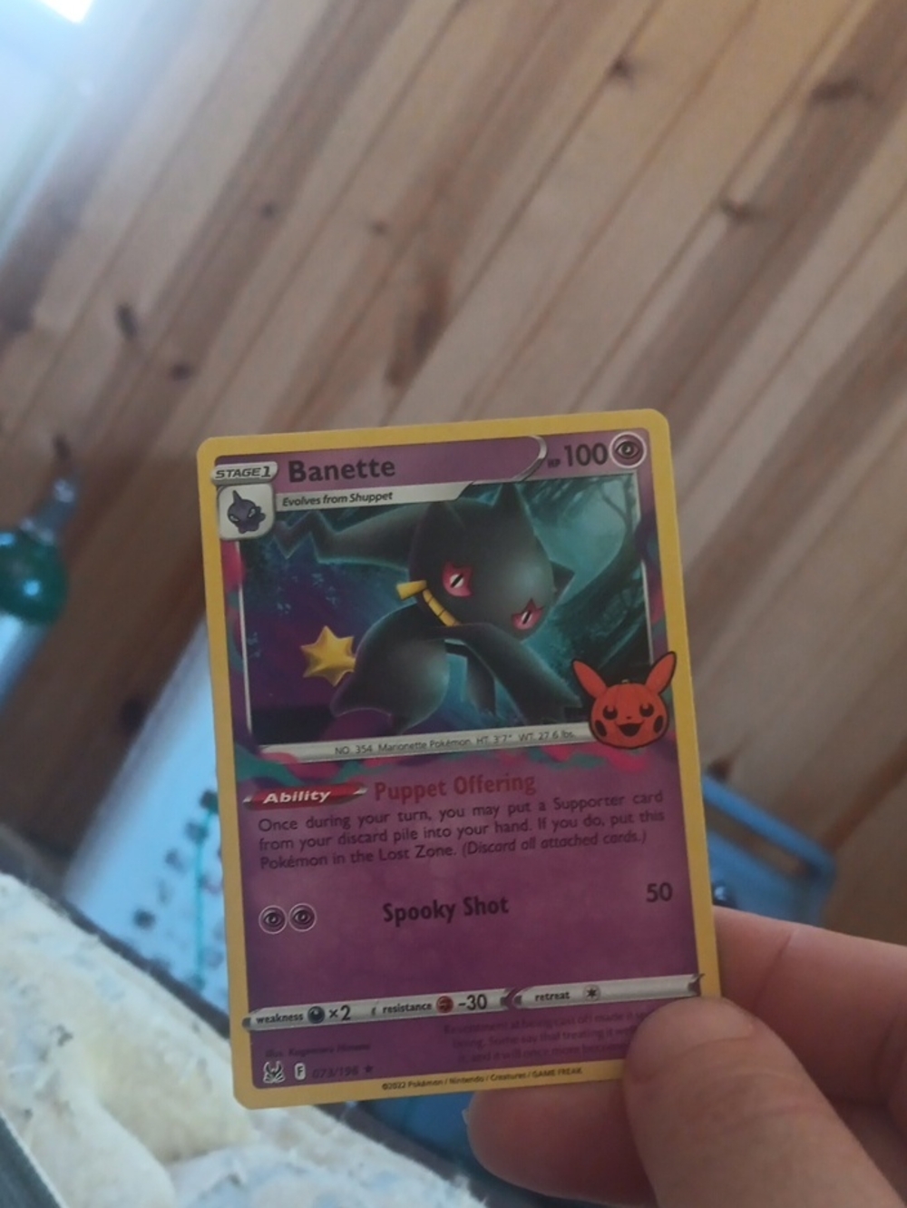 Pokemon Banette Card with Yellow Border and Purple Art